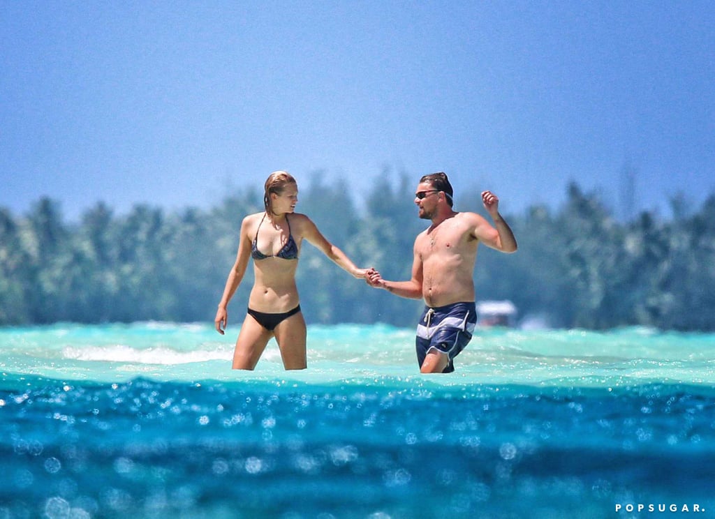 Toni Garrn led the way for Leonardo DiCaprio as the two explored their never-ending view of blue in Bora Bora.