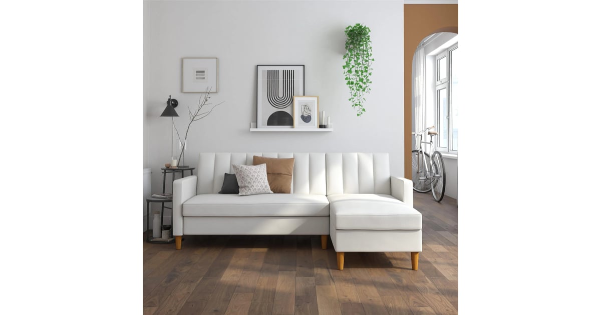 A Minimal Sectional Sleeper Allison 84" Wide Faux Leather Reversible