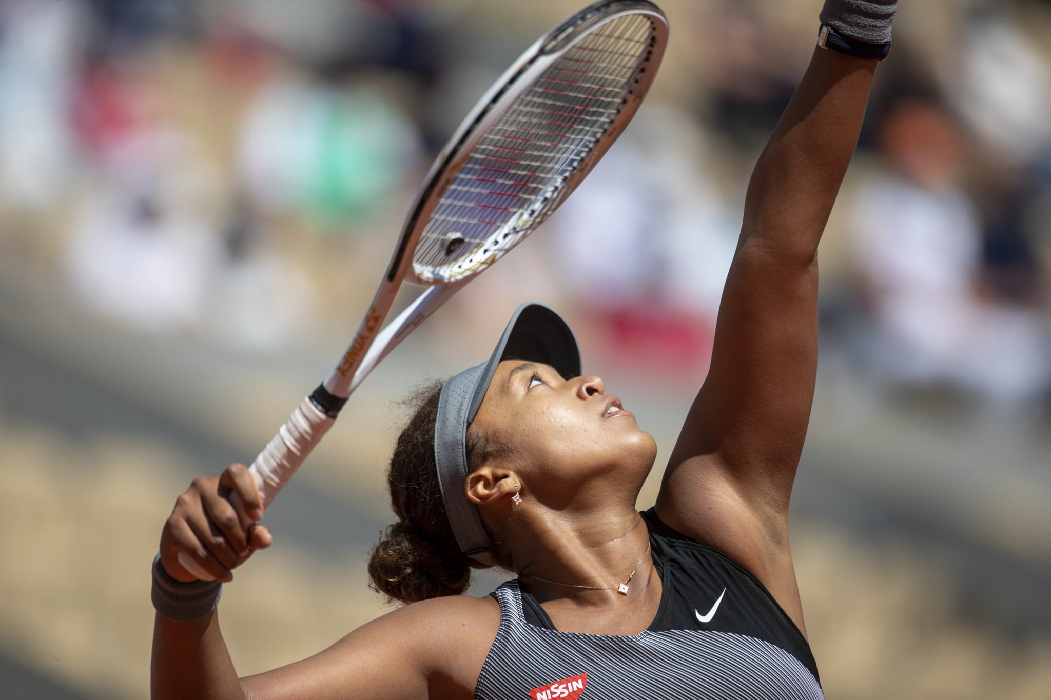 PARIS, FRANCE May 30. Naomi Osaka of Japan during her match against Patricia Maria Tig of Romania in the first round of the Women's Singles competition on Court Philippe-Chatrier at the 2021 French Open Tennis Tournament at Roland Garros on May 30th 2021 in Paris, France. (Photo by Tim Clayton/Corbis via Getty Images)