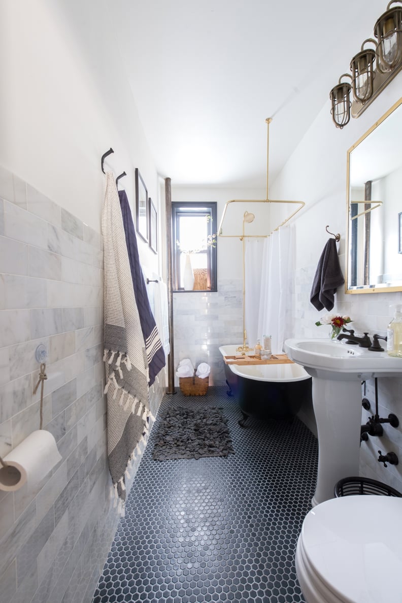 Black-and-White Bathroom With Brass Shower