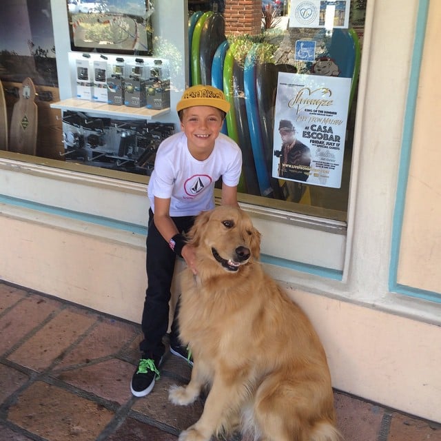 Jayden got cute with a dog in June 2015. Britney wrote in the caption, "Great Malibu dogs!"