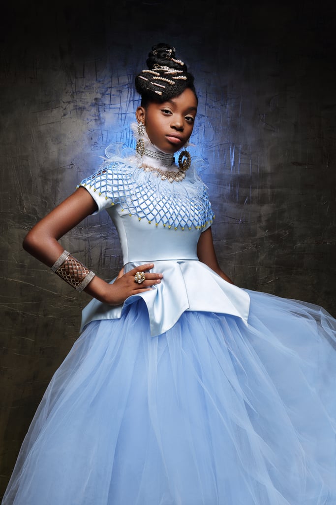 LaChanda Gatson didn't see herself in fairy-tale princesses growing up, so she decided to rewrite the story. The hairstylist teamed up with CreativeSoul Photography to bring a new royal Disney dream to life, this time with young Black girls at the center of the narrative. The result? An absolutely stunning series. 
This whimsical photo shoot is a special "passion project" of LaChanda's. It's "a collection [of] princess classic[s] reimagined with a twist of Black girl magic," she told POPSUGAR. The series draws inspiration from familiar tales, like Snow White, Sleeping Beauty, Frozen, and more. LaChanda enlisted the help of costume designers from across the globe — from Los Angeles to Nigeria — to create outfits worthy of royalty. The revamped princesses, she explained, are everything she would love to have seen growing up. "They are here to show diversity in fantasy and imagination," she said.
"None of my favorite enchanting fairytales had characters that look like me. I would always reimagine what it would be like in a more relatable way."
"When I was growing up I saw very little to no representation on television, movie, or books," LaChanda said. "None of my favorite enchanting fairy-tales had characters that look like me. I would always reimagine what it would be like in a more relatable way. As an adult I've been hired on many sets in Hollywood in both film and editorial for children, and to no surprise it's the same. Not much fantasy in that." 
"It was then that I created the change [that] I want to see," she continued. "I want to continue to create and develop spaces for inclusivity."
True to her word, LaChanda has more projects in place to follow this photo shoot. She's working on a pop-up exhibit that will be an "exhibition of royal urban fantasy" featuring "spectacular whimsical Black designs, majestic swag, Afro art, and a host [of] celebrity royals." In the meantime, she hopes her art helps young people of color see themselves "in a brighter light with endless possibilities."
"They need to know that they are too beautiful, talented, gifted, hold ancestral gifts, powerful, and just as deserving of a happily ever after." 

    Related:

            
            
                                    
                            

            14 Black Women Dressed as Disney Princesses Wearing African Prints, and the Photos Are Magic