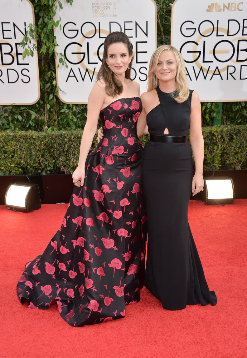 BEVERLY HILLS, CA - JANUARY 12:  Actresses Tina Fey (L) and Amy Poehler attend the 71st Annual Golden Globe Awards held at The Beverly Hilton Hotel on January 12, 2014 in Beverly Hills, California.  (Photo by George Pimentel/WireImage)