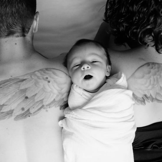 Newborn Photo Featuring Parents' Memorial Tattoos