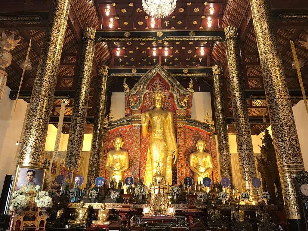 Temple-goers can offer gifts to monks, and they can view the gorgeous details, statues, and spiritual elements that the temples offer. I visited several temples while I was in Chiang Mai, but the Wat Chedi Luang temple grounds — comprised of three temples and whose construction began in the 14th century — was one that stood out to me. Located in the Old City, it's easily accessible to travelers.