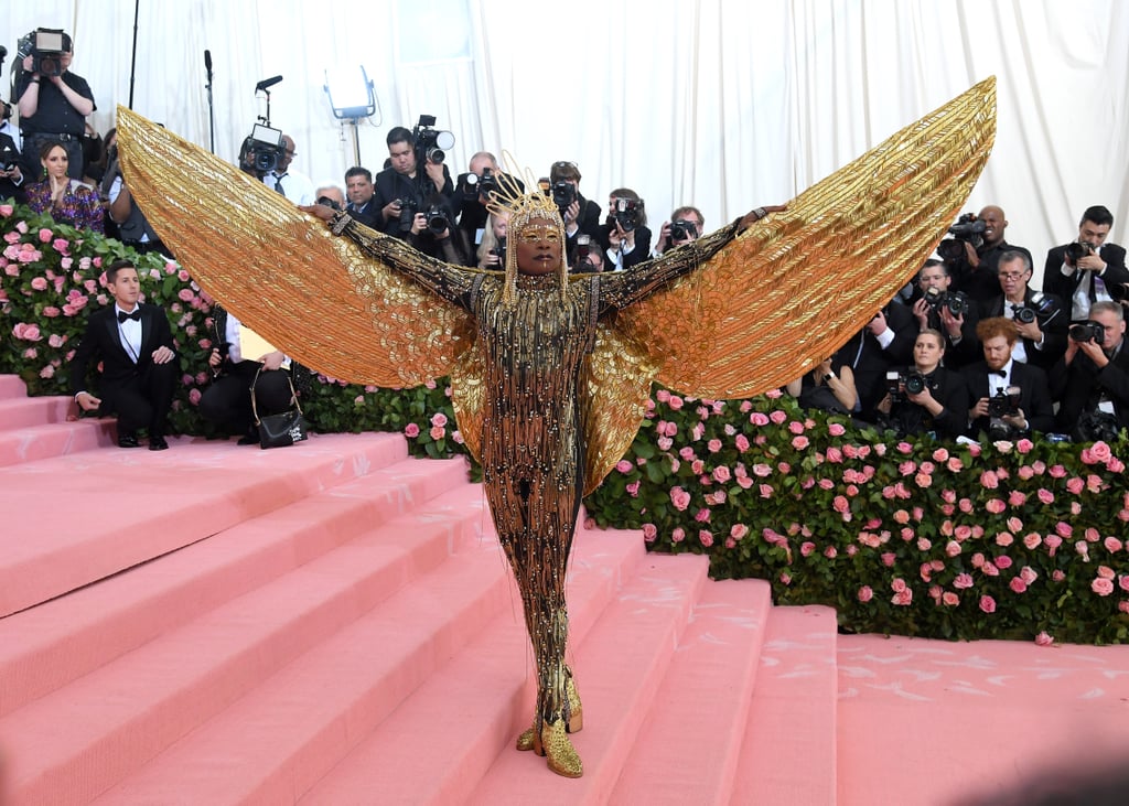 So Camp: Billy Porter Owning His Own "Sun God" Outfit With 10-Foot Wings and a 24-Karat Gold Headpiece