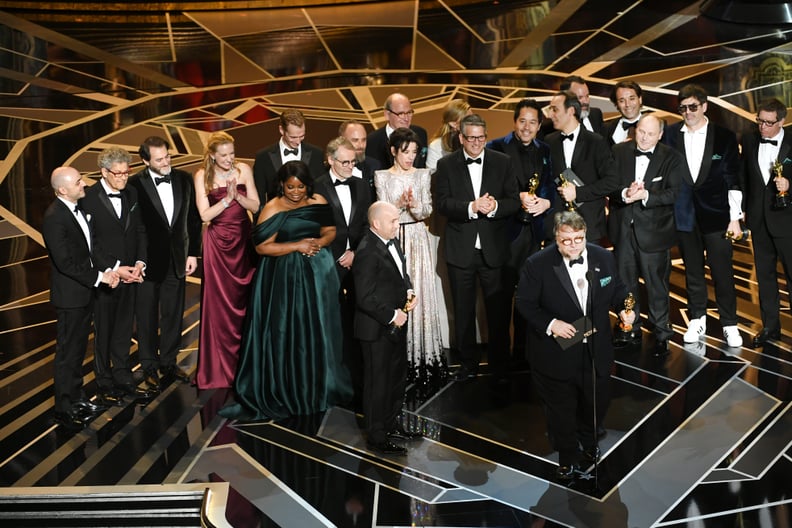 HOLLYWOOD, CA - MARCH 04:  Producer J. Miles Dale (L), director Guillermo del Toro (at microphone) and cast/crew accept Best Picture for 'The Shape of Water' onstage during the 90th Annual Academy Awards at the Dolby Theatre at Hollywood & Highland Center