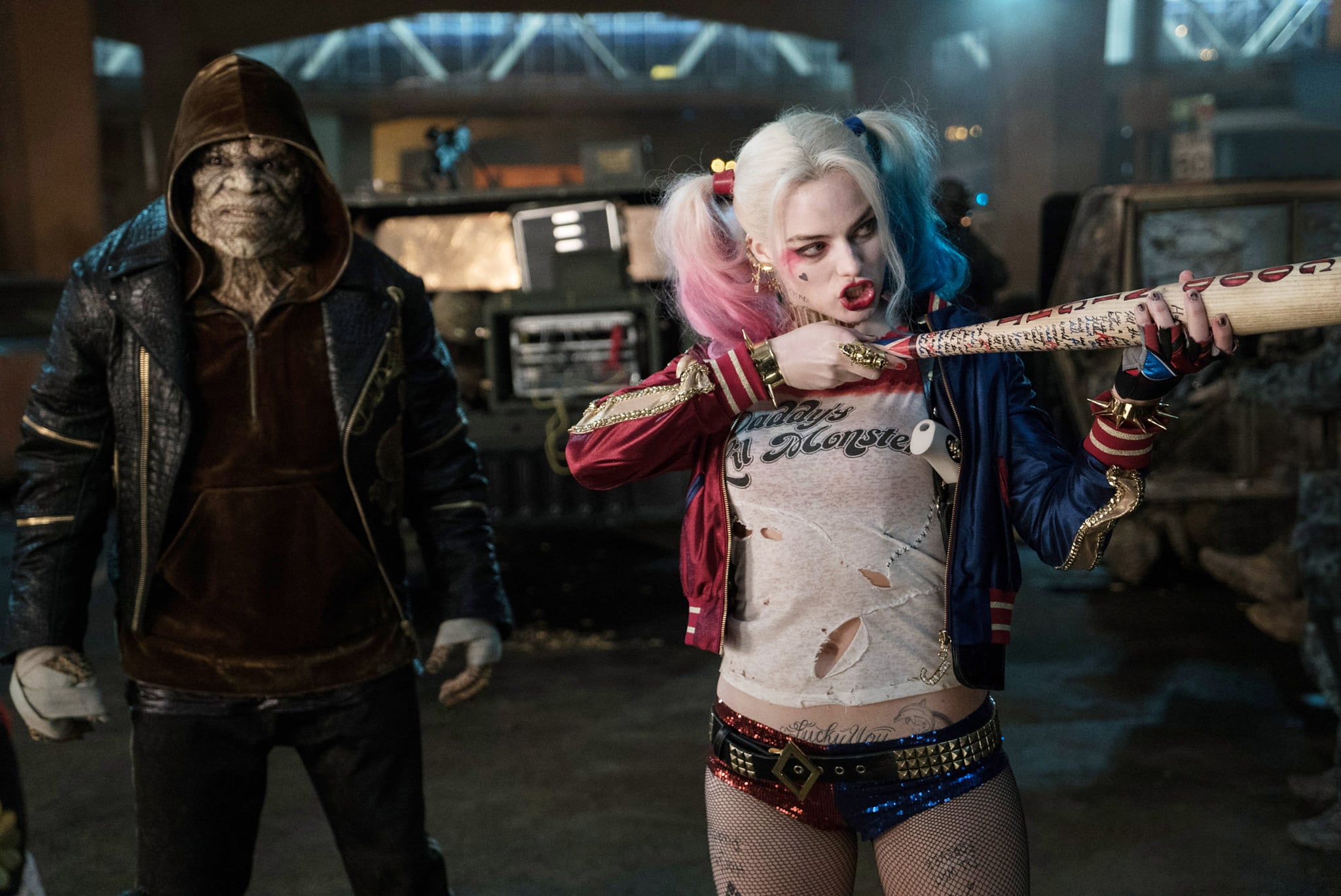 SUICIDE SQUAD, from left: Adewale Akinnuoye-Agbaje, Margot Robbie, 2016. ph: Clay Enos /  Warner Bros. / Courtesy Everett Collection