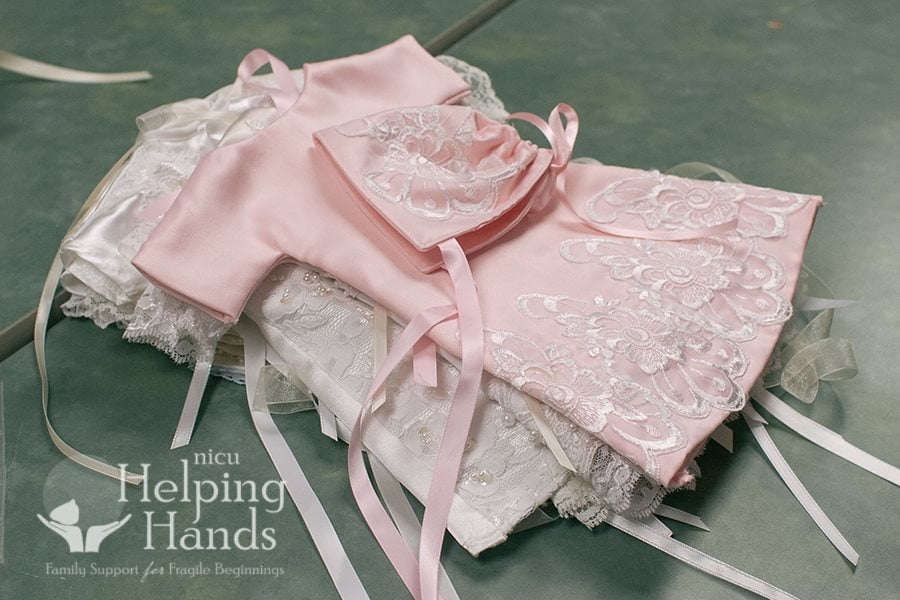 Not all the dresses are white — there are pink, blue, and yellow gowns donated, too!