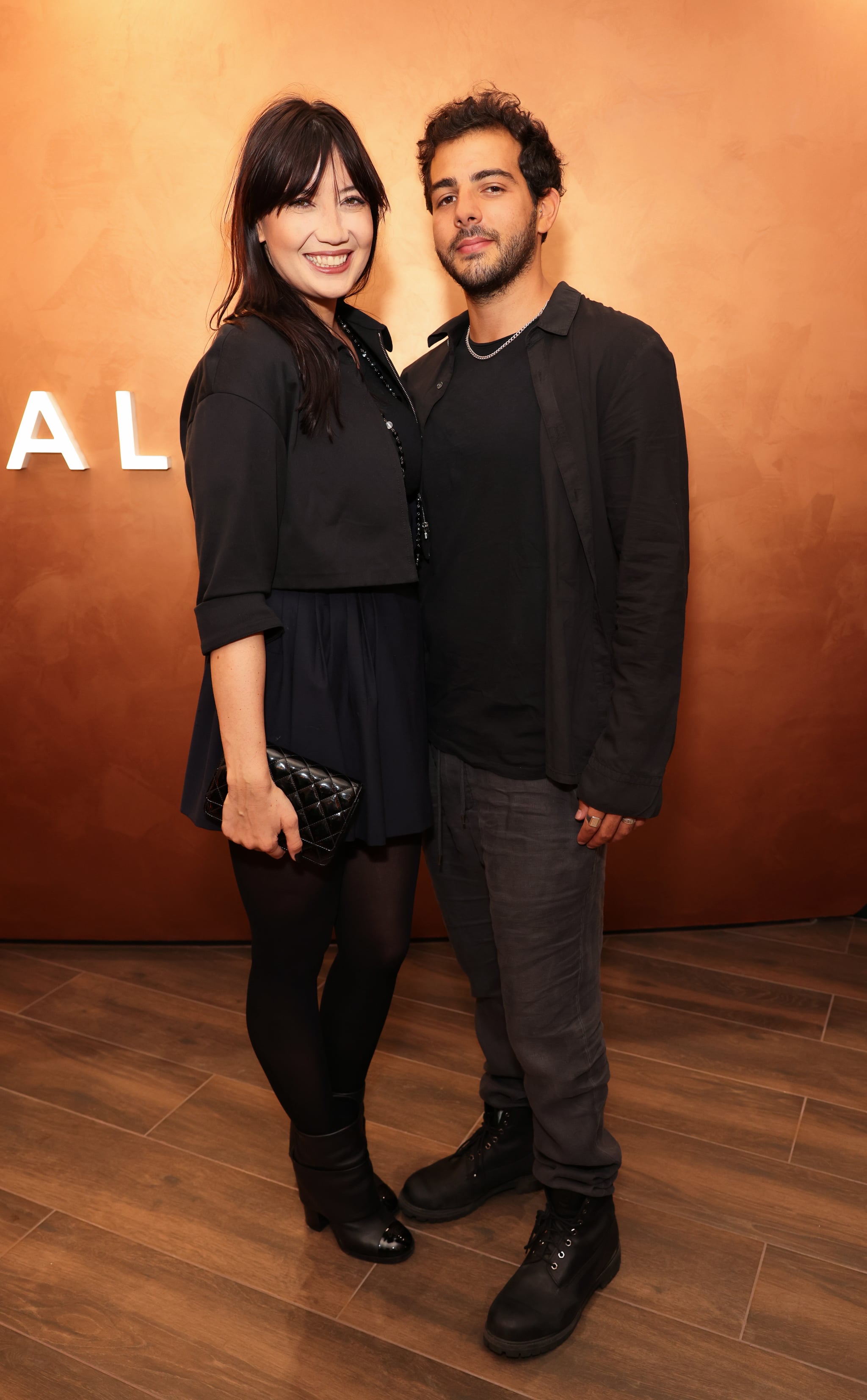 LONDON, ENGLAND - SEPTEMBER 07: Daisy Lowe (L) and Jordan Saul attend the Dr. Vali 360 Experiential Center launch at Selfridges on September 07, 2022 in London, England. (Photo by David M. Benett/Dave Benett/Getty Images for Cosmoss)