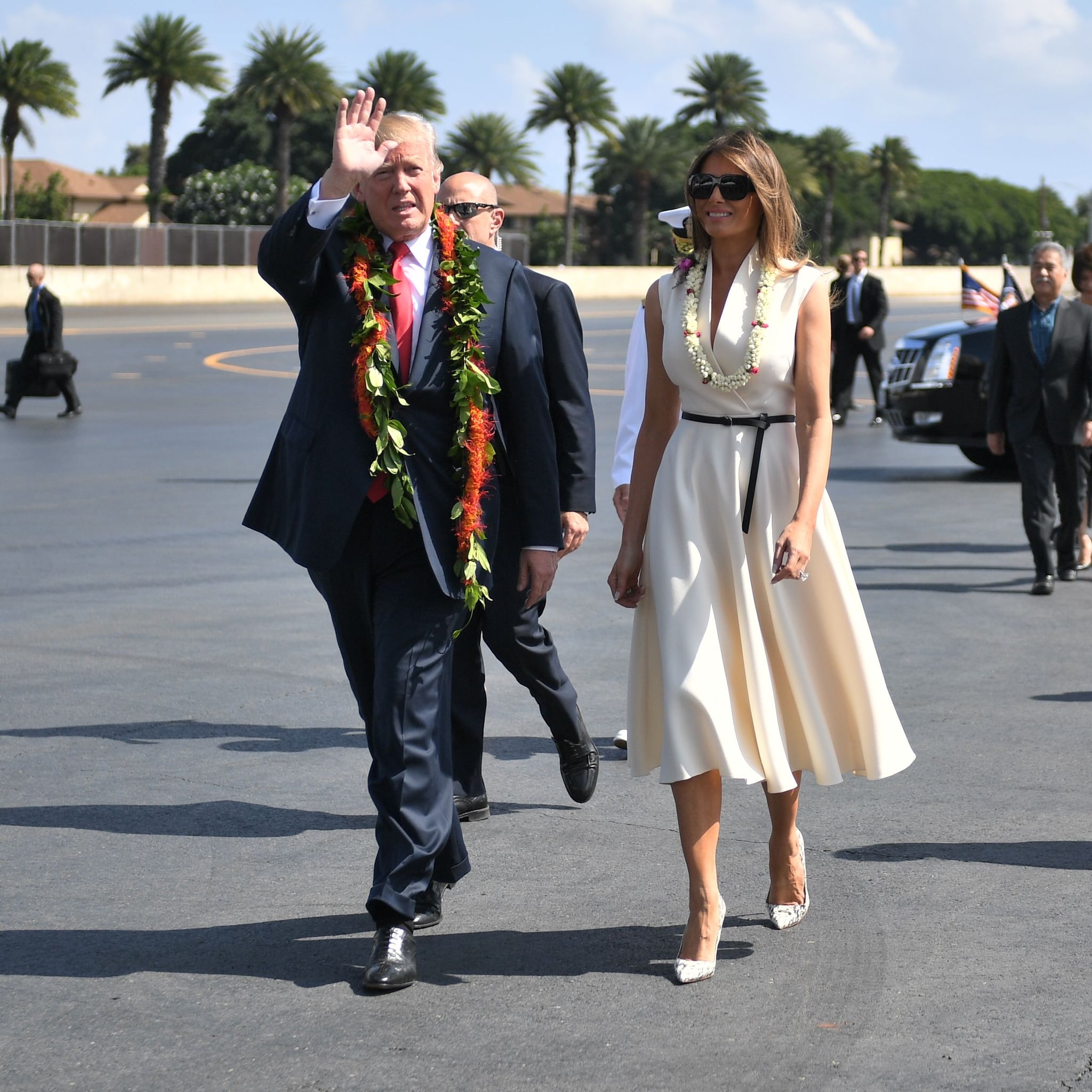 Melania in a Christian Dior White Wrap Dress  Melania Trumps Custom Dolce   Gabbana Gown Costs What Most People Pay For a Months Rent  POPSUGAR  Fashion Photo 11