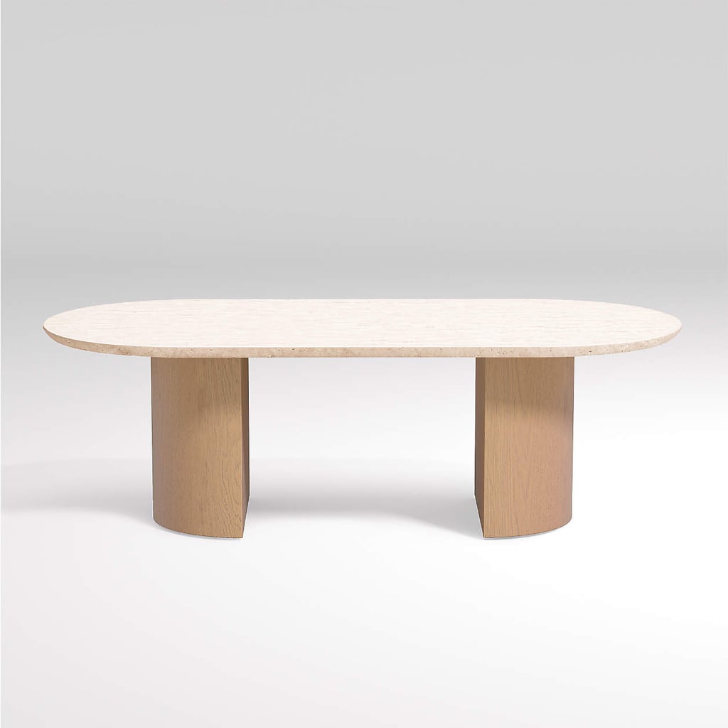 A Travertine Table: Crate and Barrel Vernet Oval Travertine Coffee Table
