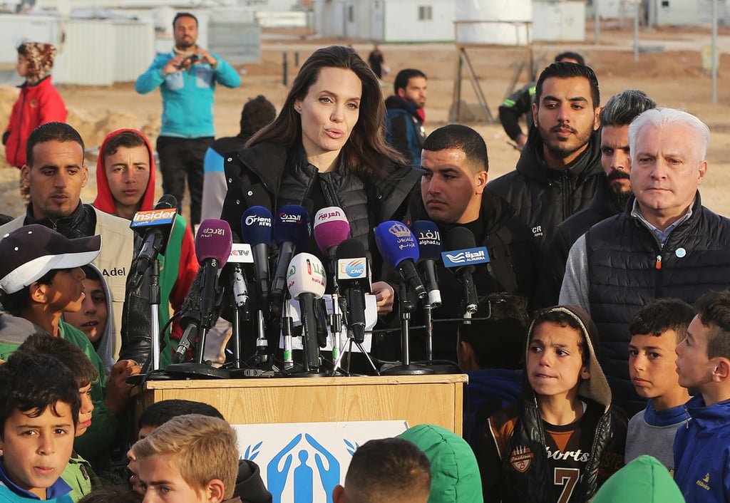 Angelina Jolie Wearing a Black Coat in Jordan