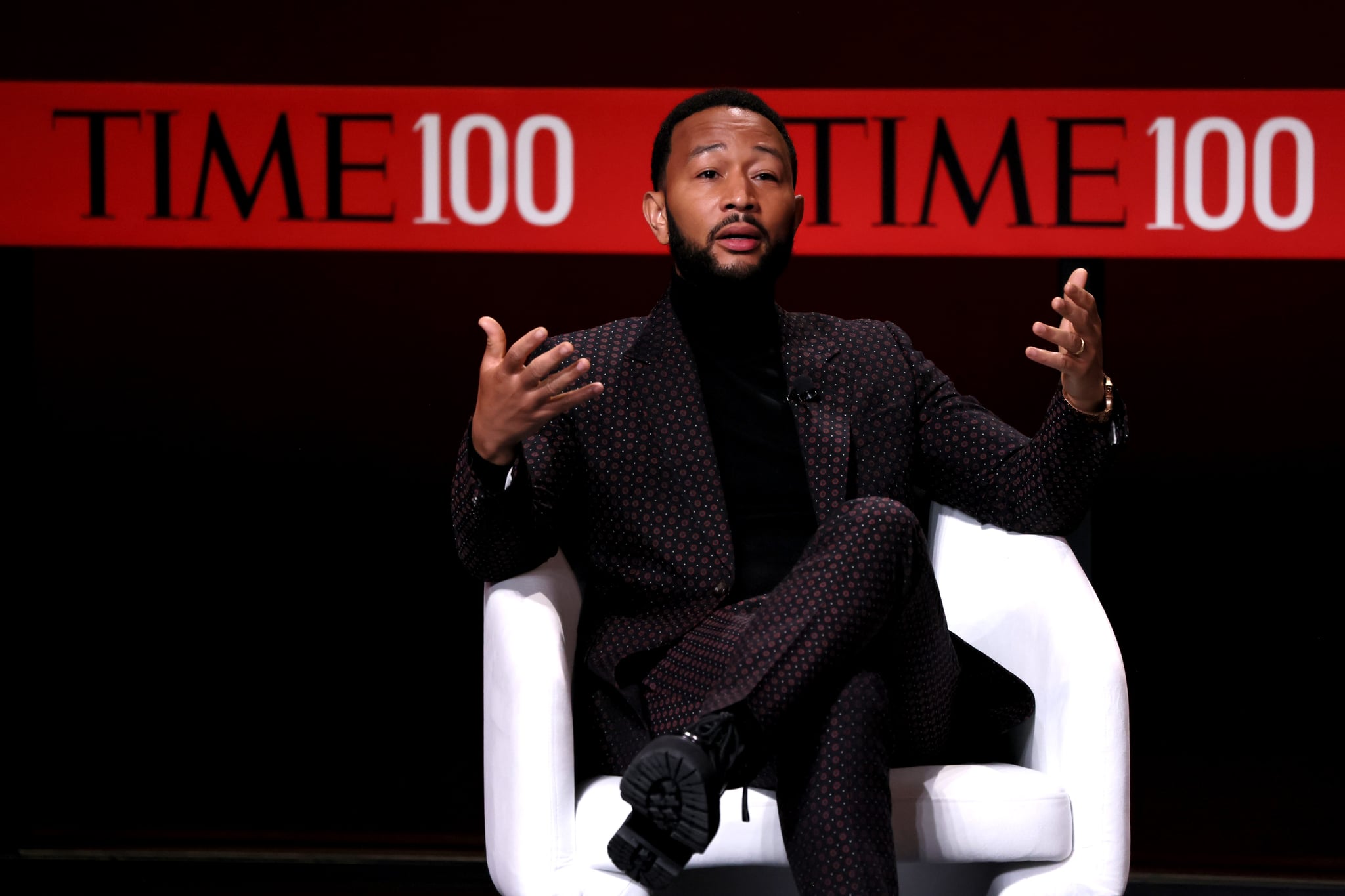 John Legend speaks onstage at the 2023 TIME100 Summit
