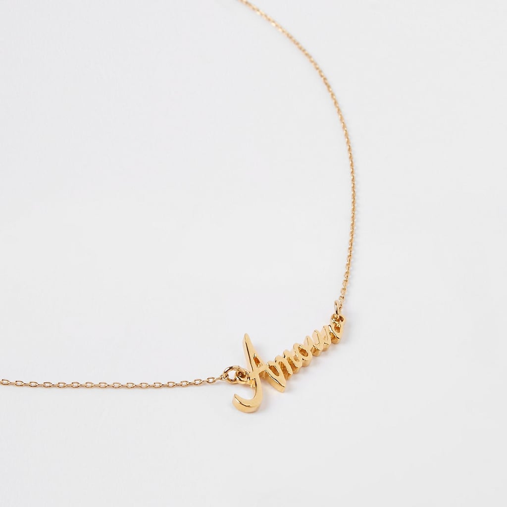 Gold plated ‘Amour’ pendant necklace