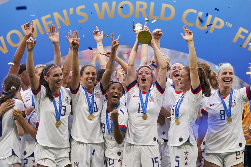 LYON, FRANCE - JULY 07: Team USA celebrates with the FIFA Womens world cup trophy at full time of the 2019 FIFA Women's World Cup France Final match between Winner The United States of America and Netherlands at Stade de Lyon on July 7, 2019 in Lyon, Fran