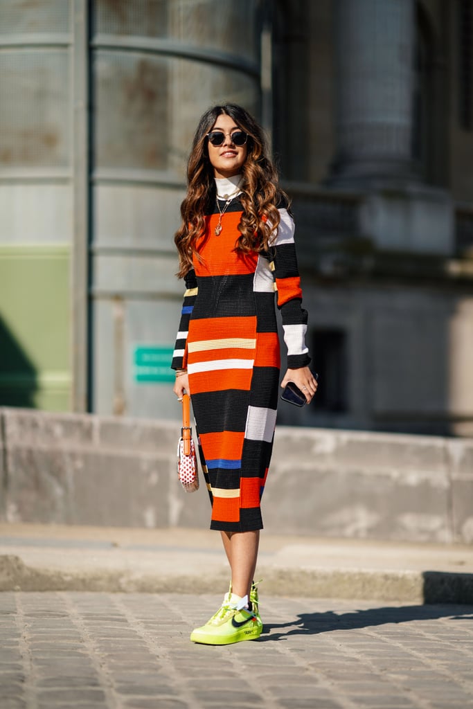 Mix brights and contrast a colorblock dress with high-octane sneakers.