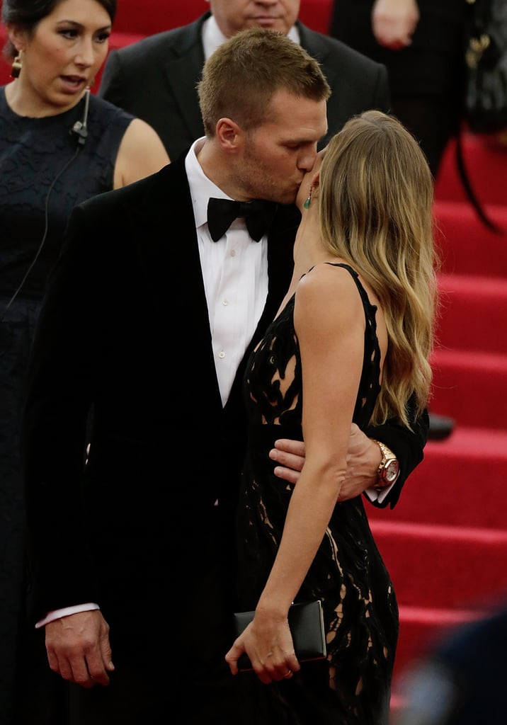 Gisele and Tom stole a handful of kisses.