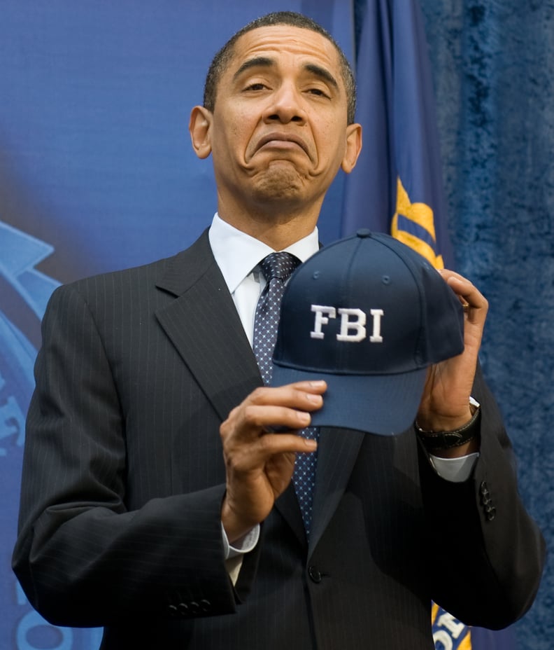 Showing off his FBI hat in 2009.