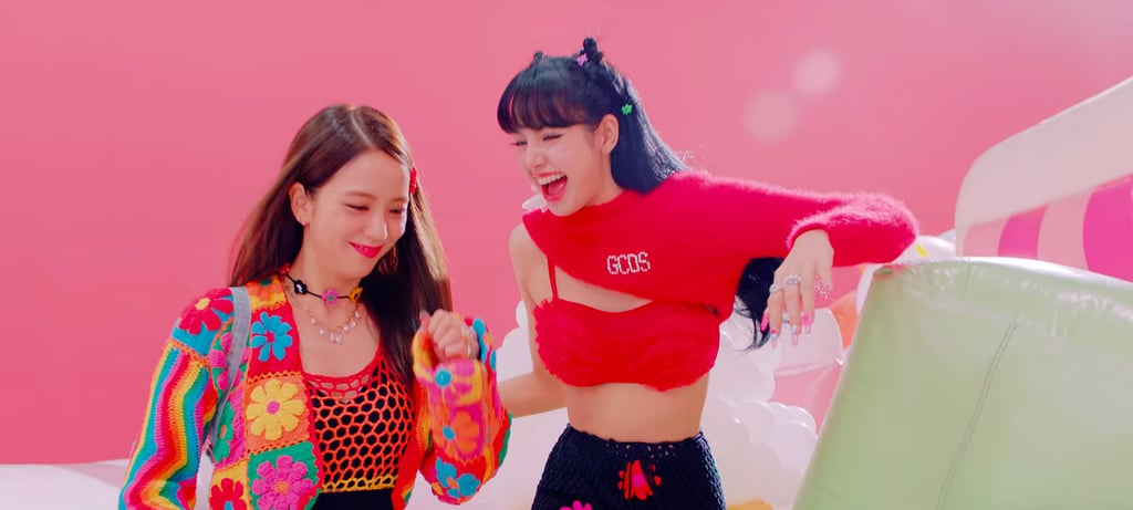 Jisoo wears crochet from Fluffy and a Merry Motive flower necklace and Lisa wears a cropped GCDS sweater.