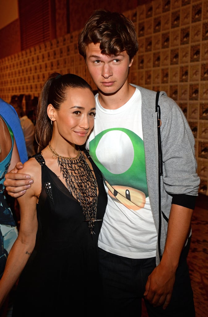 Ansel Elgort hugged Maggie Q at the Divergent press conference in 2013.