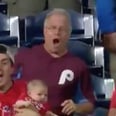 You'll Bite ALL Your Nails Watching This Dad Catch a Home Run While Holding His Baby