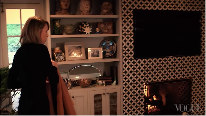 The Tiling Around Her TV and Fireplace