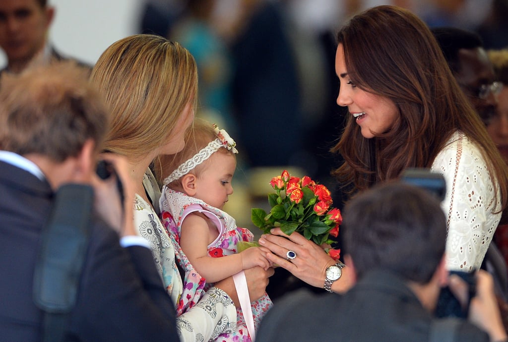 Kate smiled as she got flowers from a toddler at the Sydney Royal Easter Show in April 2014.