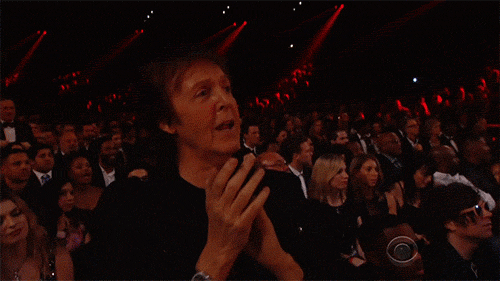 Paul was just loving the performance, clapping along.