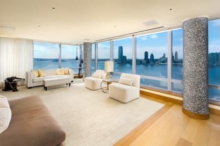 Covetable floor-to-ceiling windows wrap around the unit, providing Tyra with expansive north, south, and western city views, including the Statue of Liberty and Hudson River.