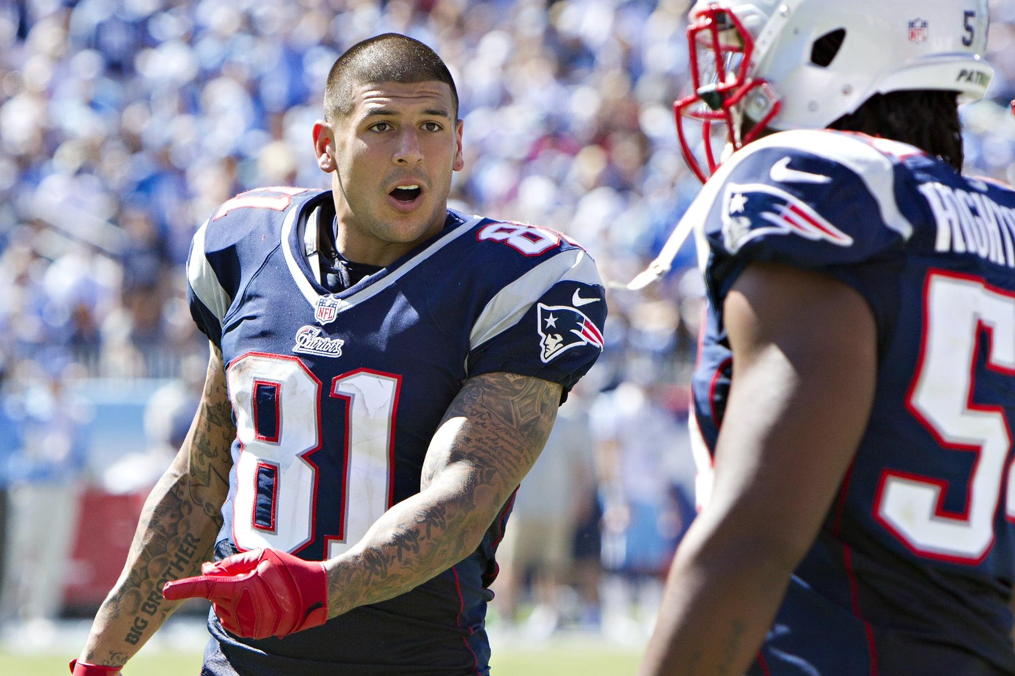 NASHVILLE, TN - SEPTEMBER 9:  Aaron Hernandez #81 talks with teammate Dont'a Hightower 354 of the New England Patriots during the season opener against the Tennessee Titans at LP Field on September 8, 2012 in Nashville, Tennessee.  The Patriots defeated the Titans 34 to 13.  (Photo by Wesley Hitt/Getty Images)