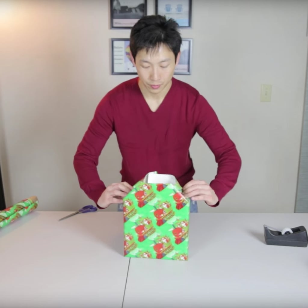 Watch This Man Show You How to Perfectly Wrap a Gift in 1 Minute and 19 Seconds