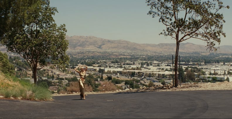 Miley Cyrus's Gold Dress in the "Flowers" Music Video