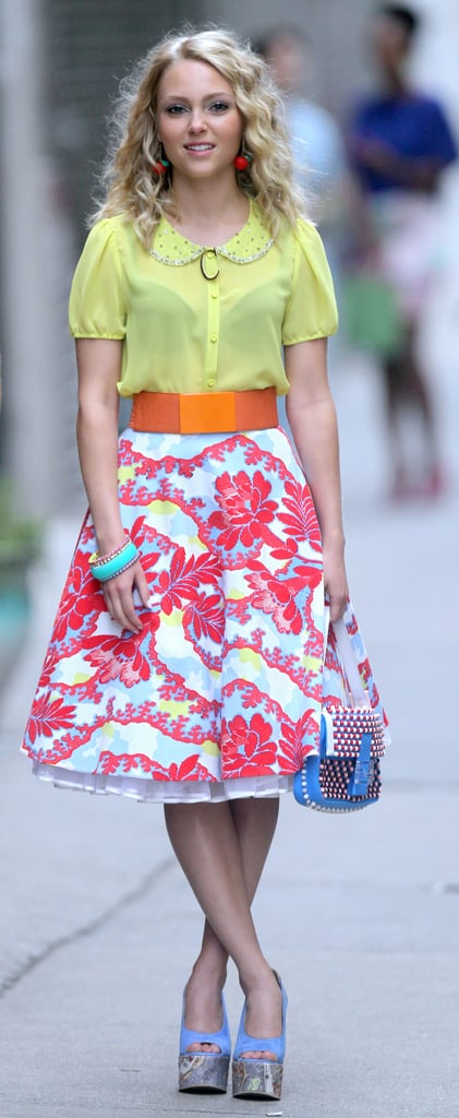 Carrie showed off her Summer brights in a sunny Peter Pan collar top, a printed Topshop skirt, and Carven platform wedges. Pair this blooming Modcloth midi ($70) with a pretty pastel blouse for your next soiree.