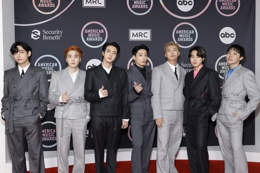 LOS ANGELES, CALIFORNIA - NOVEMBER 21: (L-R) V, Suga, Jin, Jungkook, RM, Jimin, and J-Hope of BTS attend the 2021 American Music Awards at Microsoft Theater on November 21, 2021 in Los Angeles, California. (Photo by Amy Sussman/Getty Images)