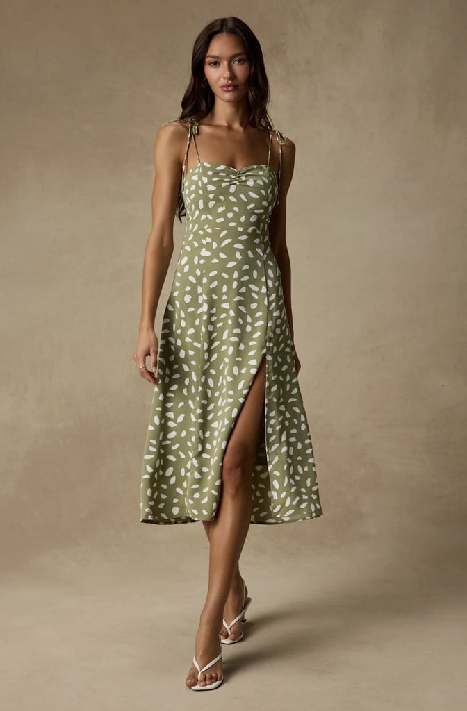 Lulus Party in Paris Sage Green Print Tie-Strap Midi Dress ($50, originally $62)
It's summer dress season! Add this bestselling frock to your list while it's on sale at Lulu's. The romantic, sage-green frock can be dressed up or down — add thong heels for date night or go casual with Birkenstocks. Get $12 off using code JUNE2026.