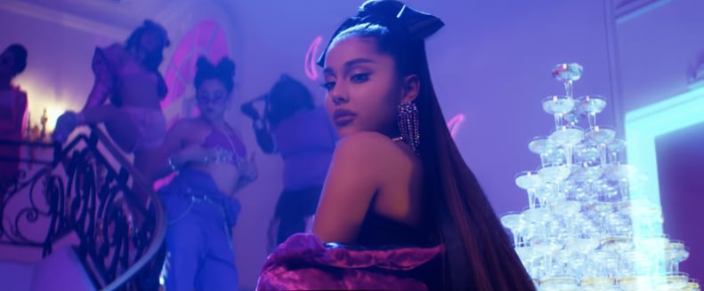 Ariana Grande's Signature High Pony Tied With a Long Black Ribbon in "7 Rings"