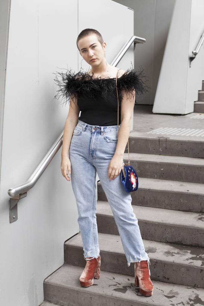Experiment with textures by teaming a pair in a light wash with a feathered Bardot top and velvet platforms.