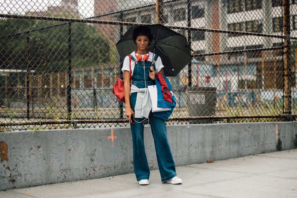 A white t-shirt is classic under denim overalls.