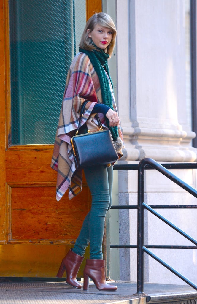 She Used Her Teal Denim and a Cozy Scarf to Play Up the Plaid in Her Poncho