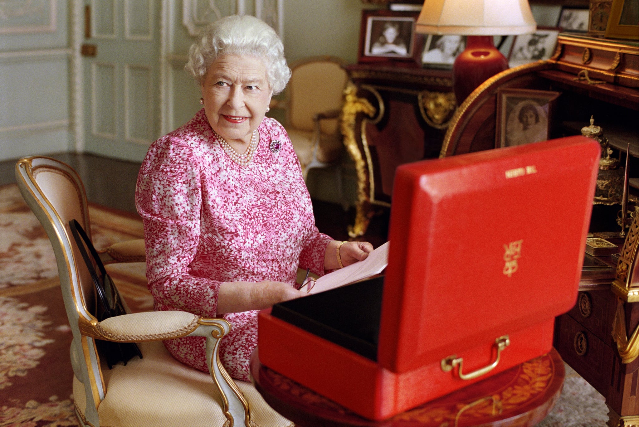 Queen Elizabeth II with one of her famous red boxes