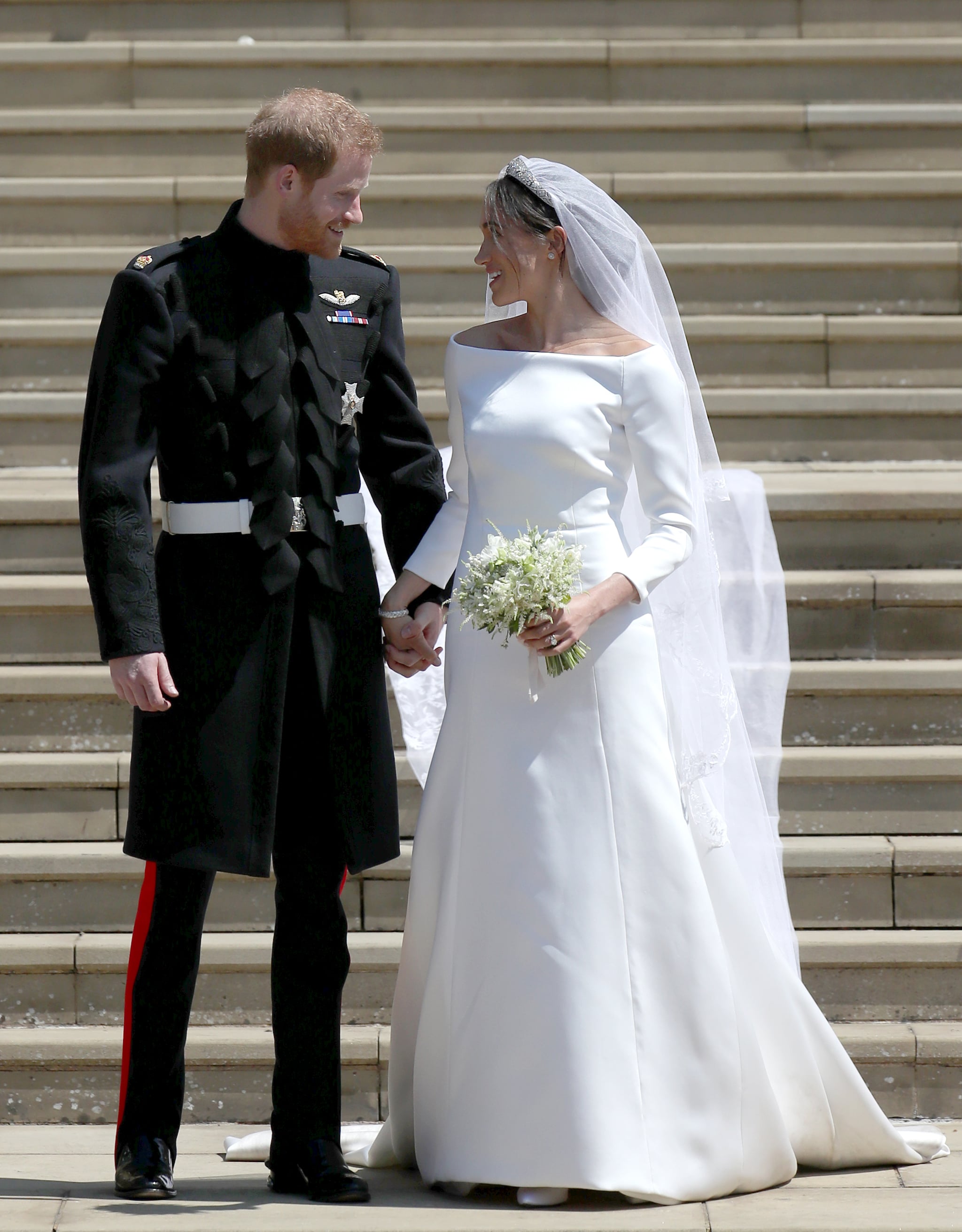 WINDSOR, UNITED KINGDOM - MAY 19:  Prince Harry, Duke of Sussex and the Duchess of Sussex depart after their wedding ceremonyat St George's Chapel at Windsor Castle on May 19, 2018 in Windsor, England. (Photo by Jane Barlow - WPA Pool/Getty Images)