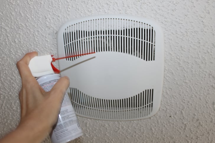 Dust The Bathroom Exhaust Fan With Canned Air Dusting