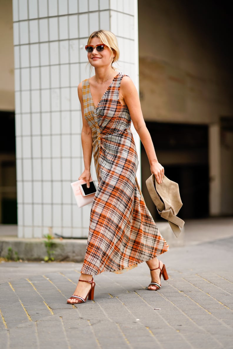 Give a plaid pattern the boho treatment in a flowing silhouette; then add a suede bag to drive it home.