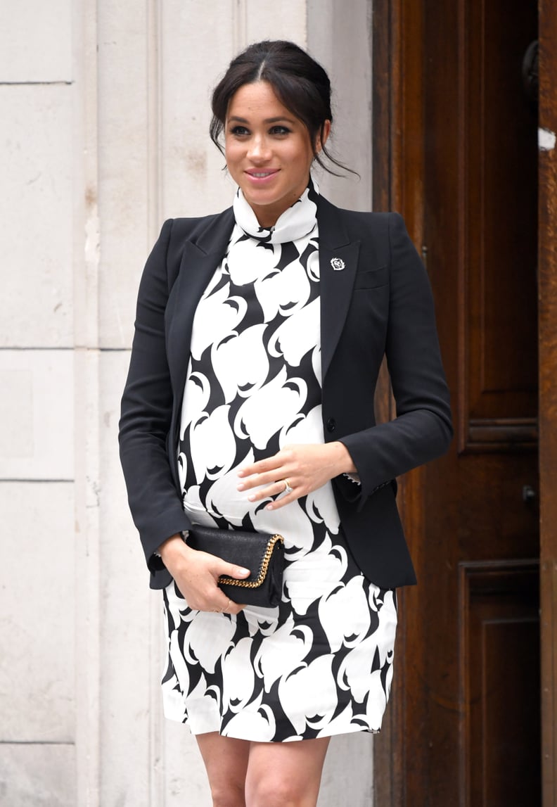 LONDON, ENGLAND - MARCH 08: Meghan, Duchess of Sussex departs after joining a panel discussion convened by The Queen's Commonwealth Trust to mark International Women's Day at King's College London on March 08, 2019 in London, England. (Photo by Karwai Tan