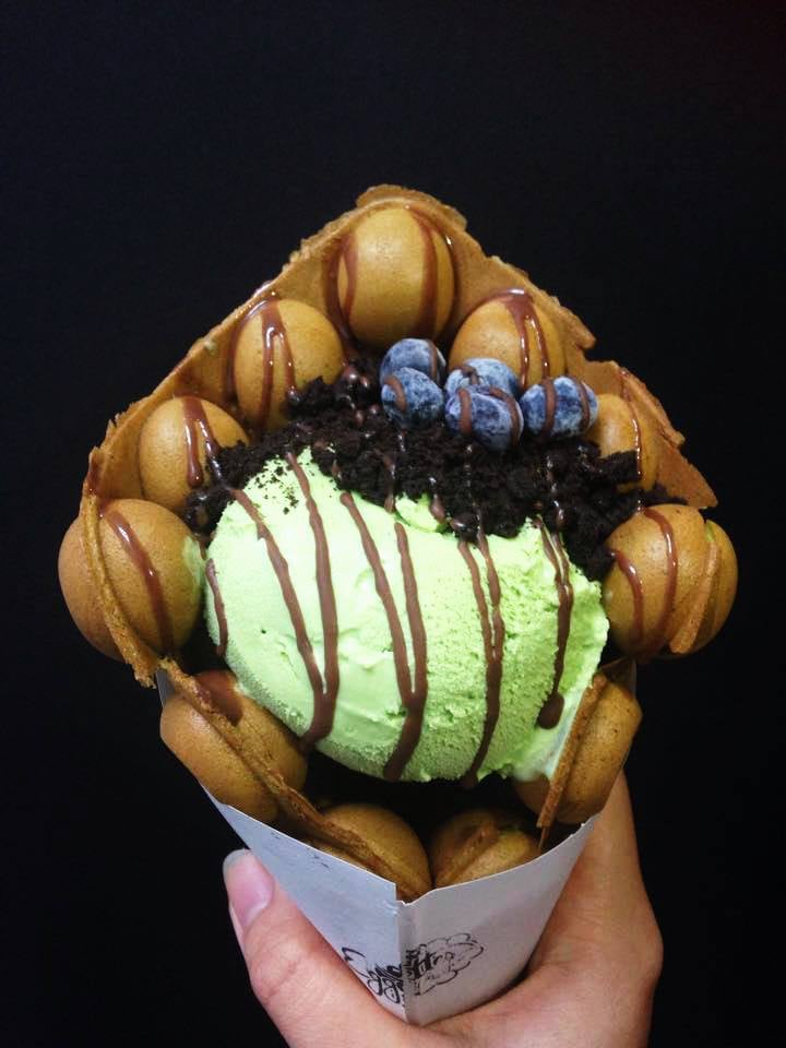 Matcha Eggette Cone With Green Tea Ice Cream, Oreos, Blueberries, and Chocolate Syrup