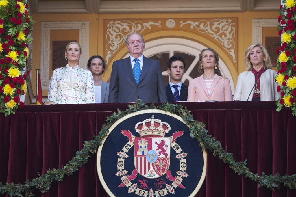 King Juan Carlos and Princess Elena de Borbón (in pink) at the La Beneficiencia Bullfight in Madrid, Spain.