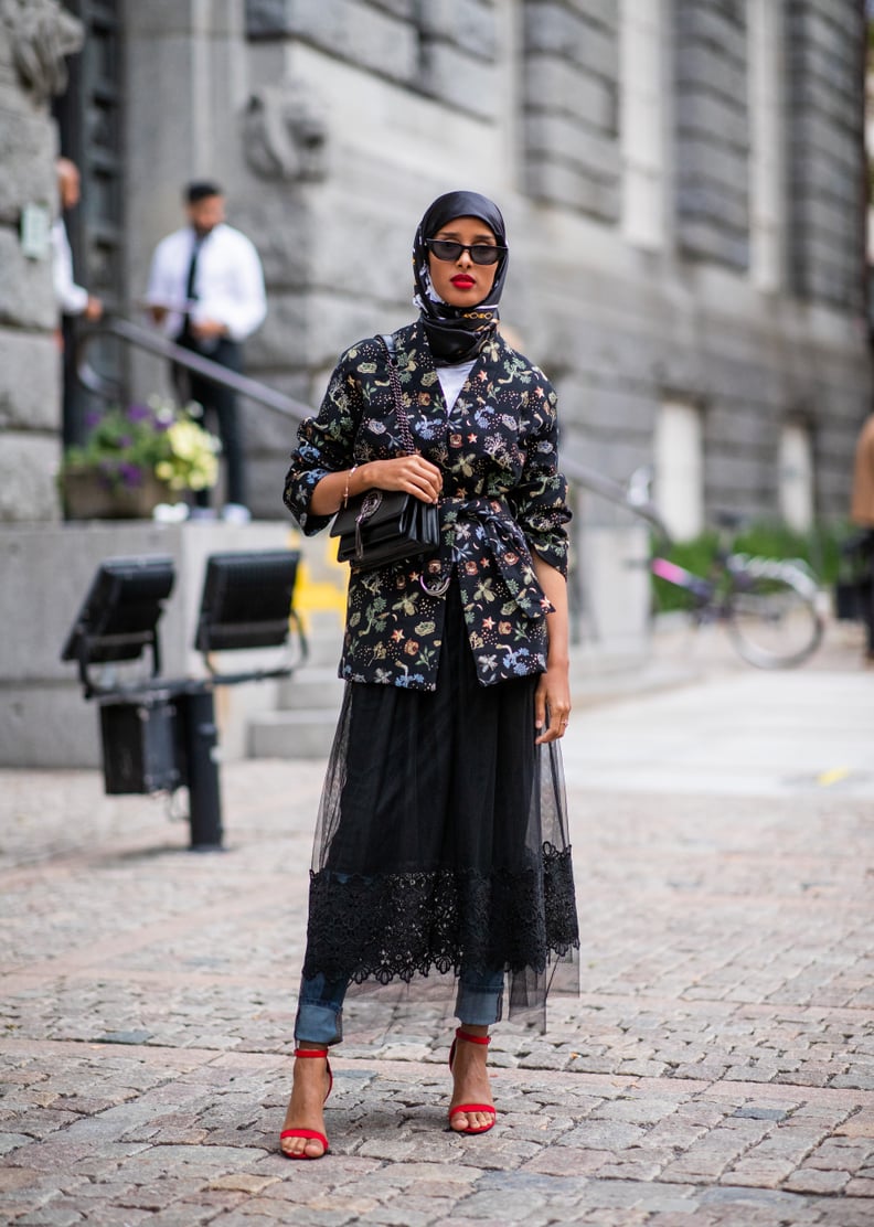 Underneath a Tulle Skirt With a Printed Jacket and Red Heels