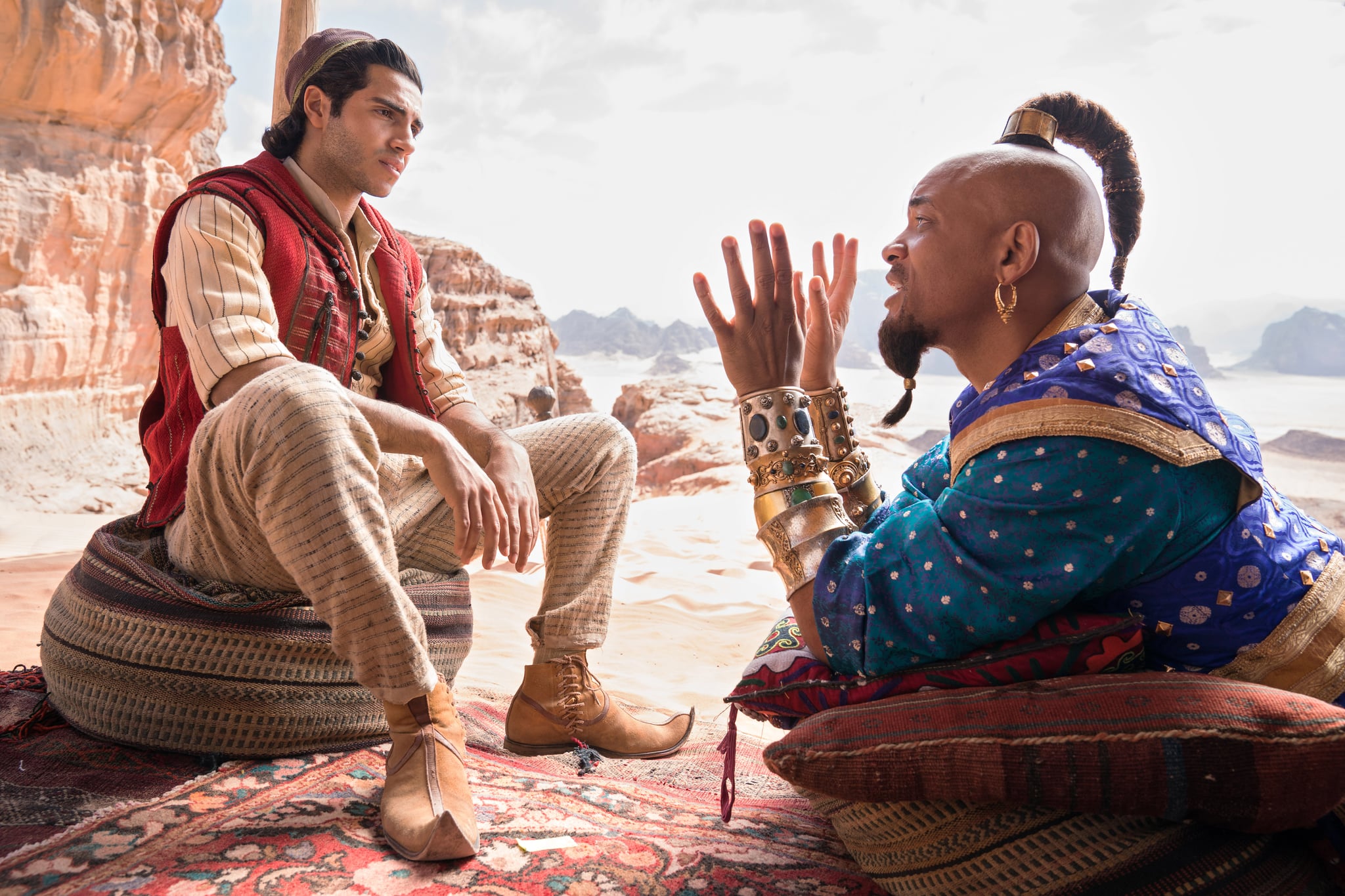 Mena Massoud as the street rat with a heart of gold, Aladdin, and Will Smith as the larger-than-life Genie in Disney's ALADDIN, directed by Guy Ritchie.