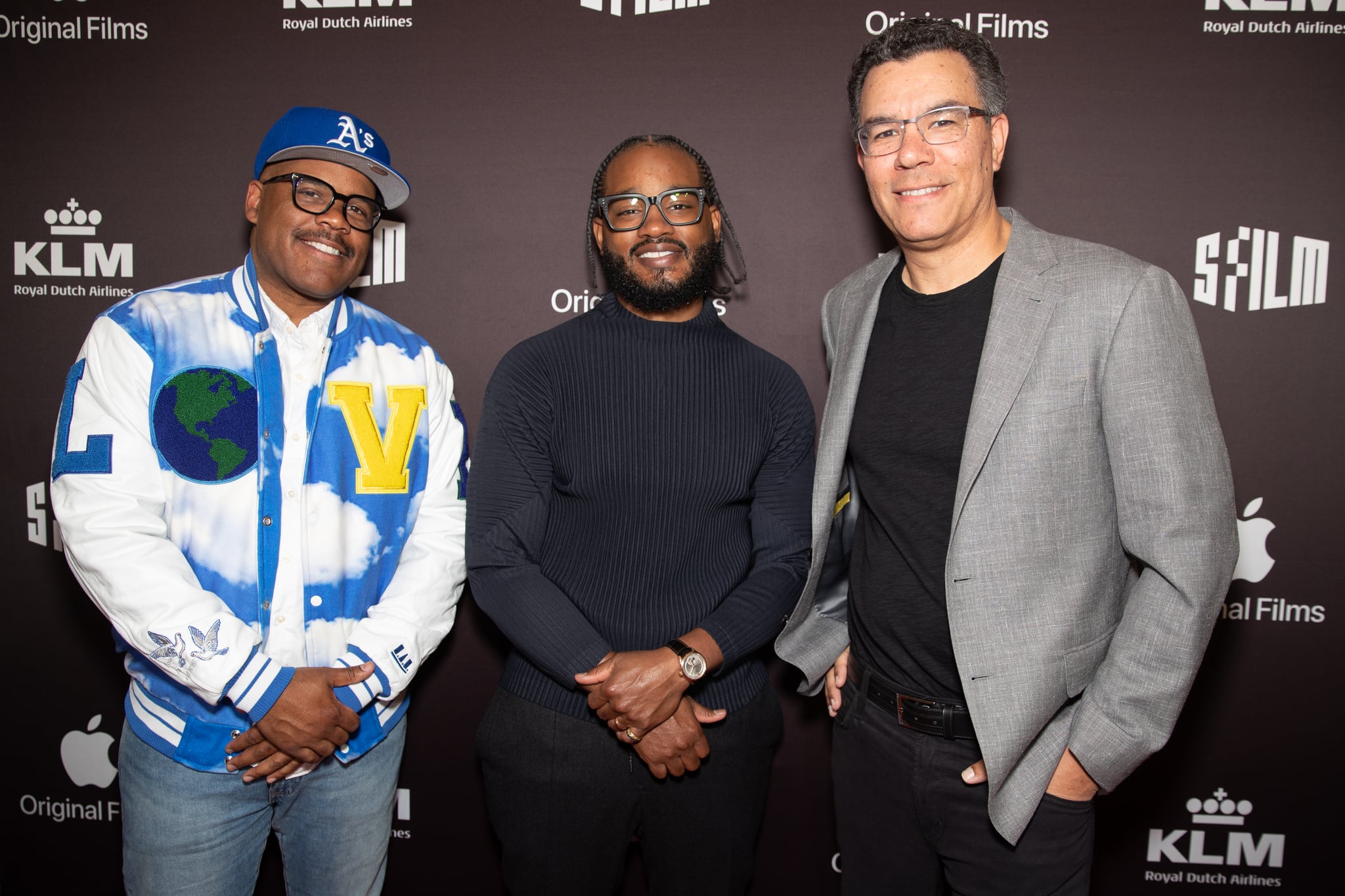 OAKLAND, CALIFORNIA - APRIL 13: (L-R) Producers Eric Peyton, Ryan Coogler and director Peter Nicks arrive at the opening night premiere of 